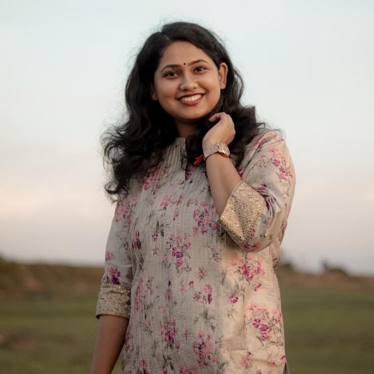 Alex Rivera, Lead Design Curator at LoftGroveAtelier, reviewing corporate floral arrangements